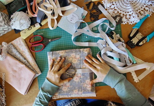 handmade creating of the diary from special scrapbooking paper