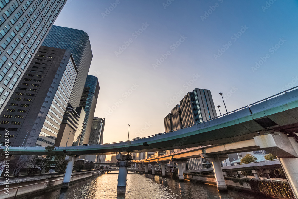 Naklejka premium Osaka cityscape - Nakanoshima district at dusk - Osaka Japan