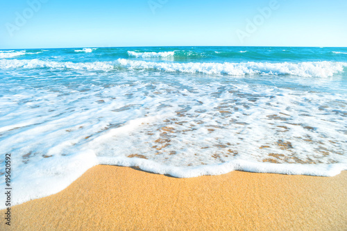 Tropical beach with sand and sea wave at background. Macro shot © Pavlo Vakhrushev