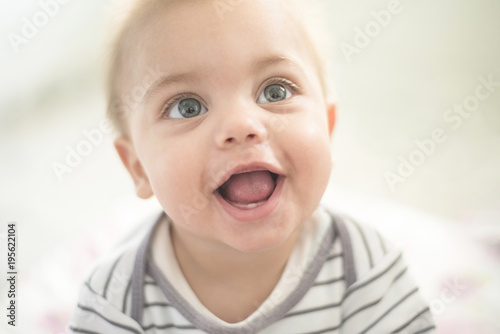 Baby smiling - Baby tooth photo