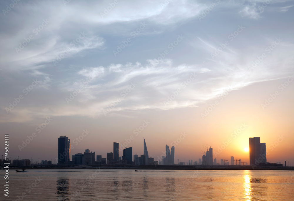 A beautiful view of Bahrain skyline during evening hours at sunset