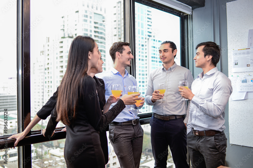 business man and business woman drinking champagne and talking while celebrating in office, successful business concept, vintage style business man and business woman drinking champagne and talking while celebrating in office, successful business concept, vintage style