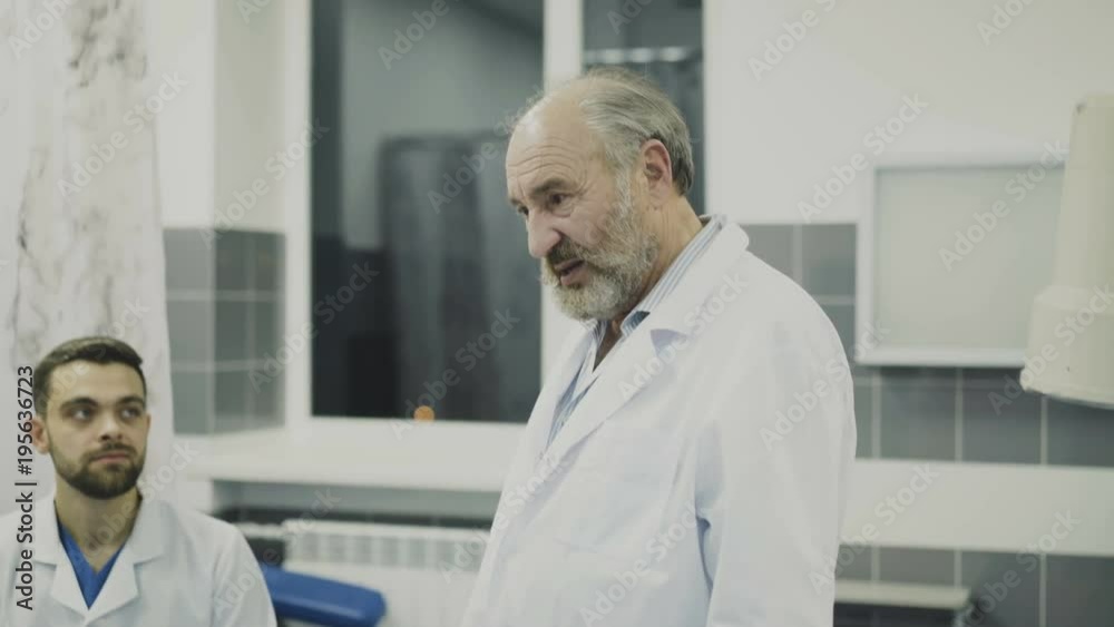 Doctors takling with co-worker on break in the rest room. 4K Doctors takling with co-worker on break in the rest room. 4K