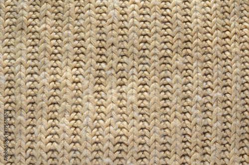 Knit Texture of Wool Knitted Fabric with Regular Pattern. Knit Sweater Texture