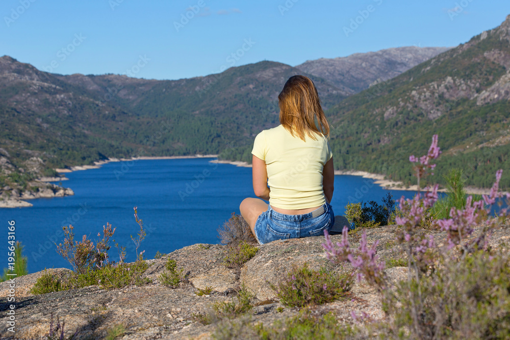 girl enjoying the lake