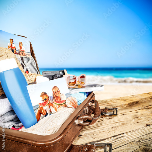 Summer suitcase and beach