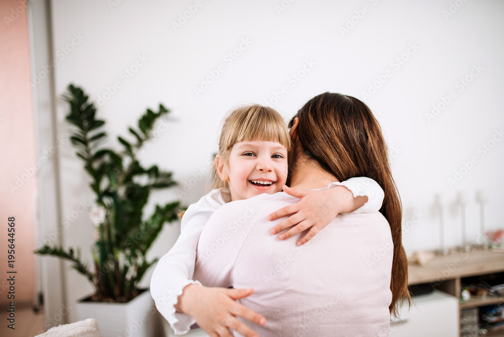 Picture of hugging mother and daughter Picture of hugging mother and daughter