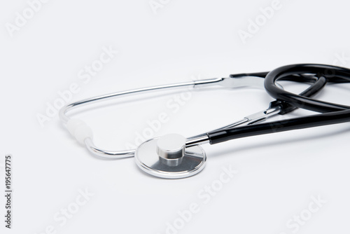 Medical equipment stethoscope or phonendoscope on white table close up