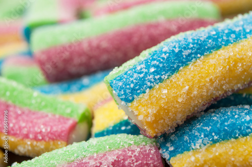 closeup of acidulous candies in shaped french fries texture