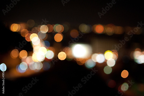 Wallpaper Mural Close up Blurred Defocused bright multicolored yellow green red city lights in bokeh effect Torontodigital.ca