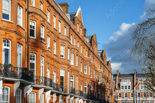 Canvas Print Expensive Edwardian block of period red brick apartments typically found in Kensington, West London, UK