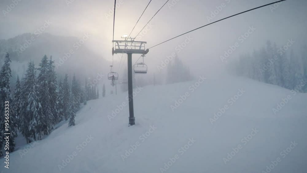 Moody Chairlift Ride in Hazy Winter Fog