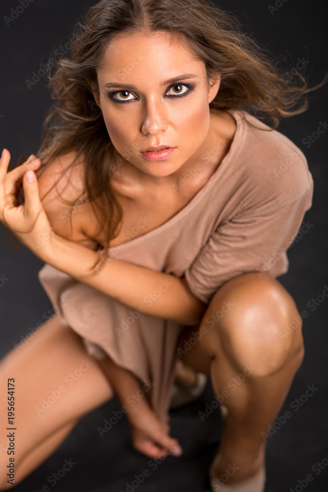 Beautiful sensual woman looking at camera Beautiful sensual woman looking at camera