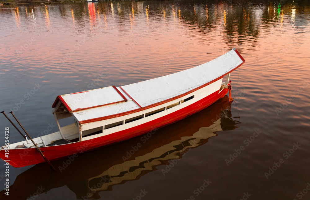 traditional wooden boat on the Sarawak River