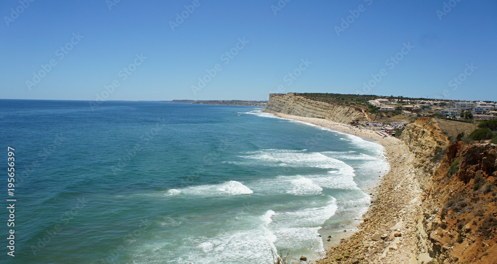 Atlantic ocean - beach under rock in Algarve