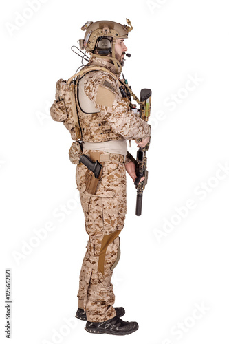 Special forces soldier with rifle on white background. army, military and people concept © kaninstudio