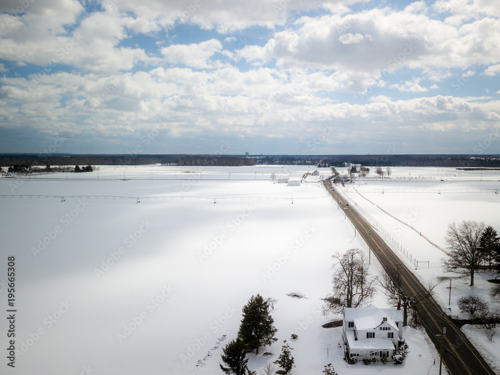 Aerial of Snow covered farmland
