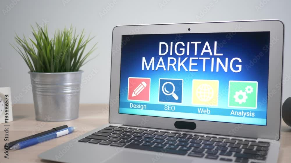 Digital marketing strategies showing on a laptop computer screen sitting on a desk. Camera is slowly turning around the computer. Digital marketing strategies showing on a laptop computer screen sitting on a desk. Camera is slowly turning around the computer.