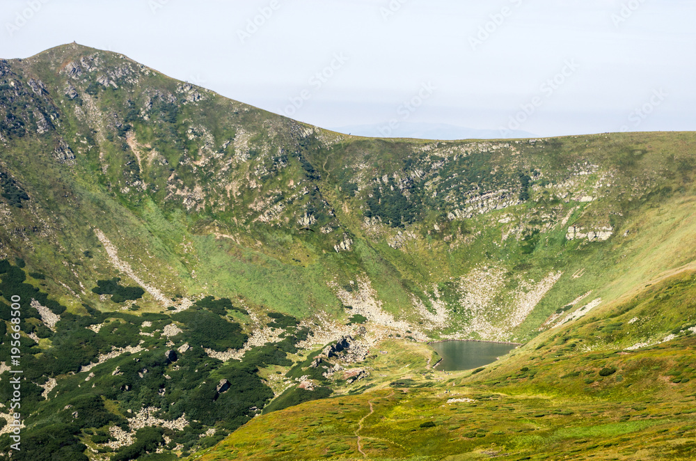 Fototapeta premium Fresh water in the mountains. Mountain Lake.