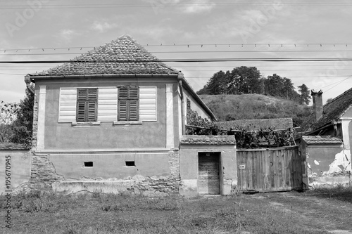 Typical rural landscape and peasant houses in Bradeni, Henndorf, Hegendorf,  Transylvania, Romania. The settlement was founded by the Saxon colonists in the middle of the 12th century photo