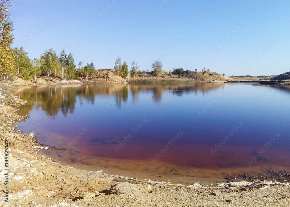 Obraz premium The dirty lake is in the quarry area