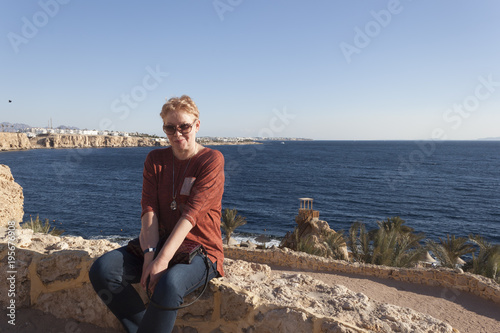 Portrait of a mature woman against the background of the Red Sea