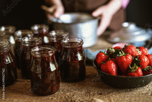 Preparing homemade strawberry jam photo