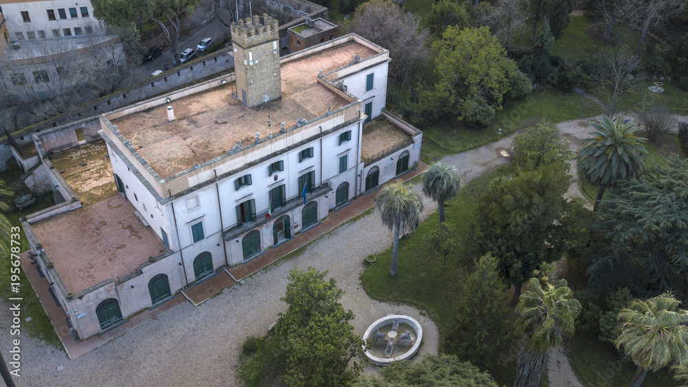 Aerial view of Villa Sciarra is an urban villa in Rome located on the slopes of the Gianicolo hill between the districts of Trastevere and Monteverde, next to the Gianicolan Walls. Now it is a park. Aerial view of Villa Sciarra is an urban villa in Rome located on the slopes of the Gianicolo hill between the districts of Trastevere and Monteverde, next to the Gianicolan Walls. Now it is a park.