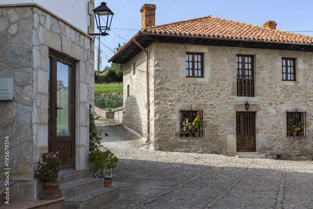 Street view in historic center in touristic village of Santillana del Mar, province Santander, Cantabria, Spain.