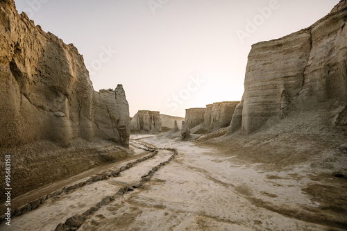 path leading through a gorge in the desert, queshm island, iran