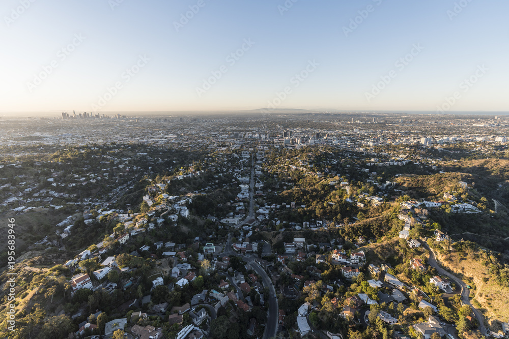 Aerial morning view of hillside homes in the Beachwood Canyon neighborhood near Griffith Park in Los Angeles California. Aerial morning view of hillside homes in the Beachwood Canyon neighborhood near Griffith Park in Los Angeles California.