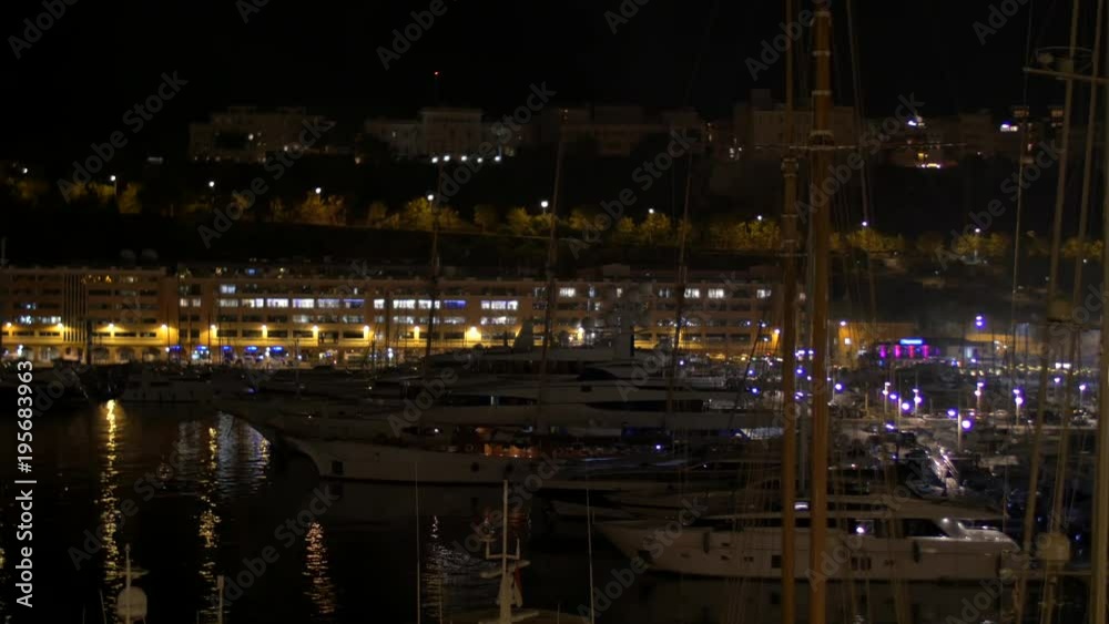 Boats in Hercules Port at night in Monaco Boats in Hercules Port at night in Monaco