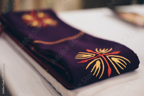 Clergy stole for priests and deacons. Selective focus. Copy space.  photo