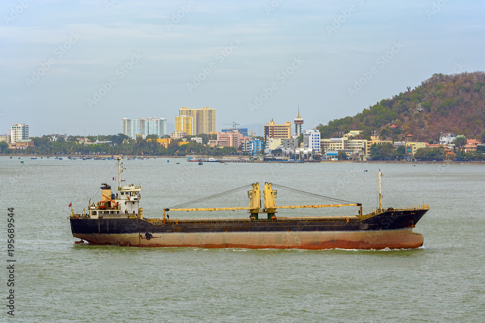 Bulk carrier vessel at coastal water. Bulk carrier vessel at coastal water.