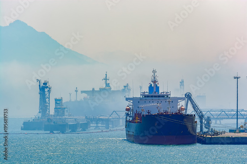 Crude oil tanker under cargo operations photo