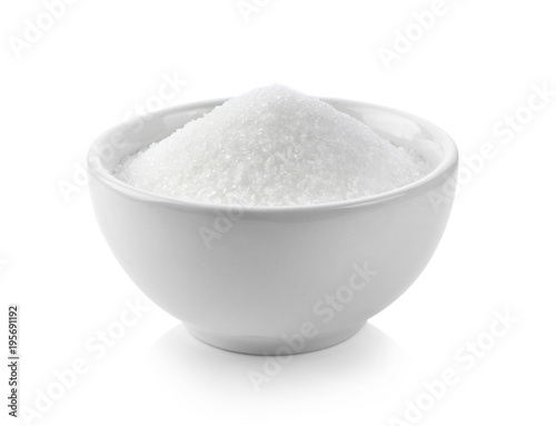sugar in white bowl on white background