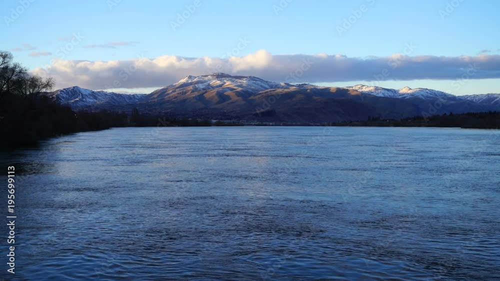 Columbia River Flows under Snow Covered Ridge Washington