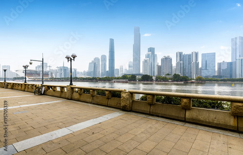 Panoramic skyline and buildings with empty concrete square floor in guangzhou,china © onlyyouqj