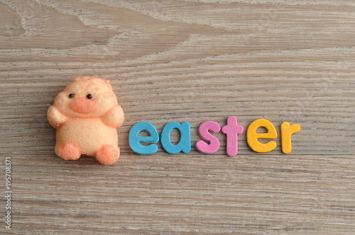 A chicken shape marshmallow with the word easter photo