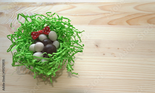 candies in nest decorated with bow