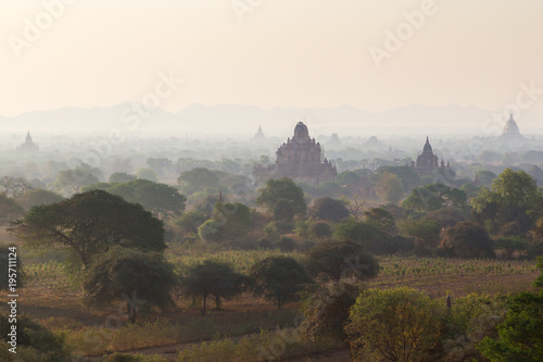 Several temples and pagodas at the ancient plain of Bagan viewed from the Shwesandaw Temple in Myanmar (Burma), in the morning.