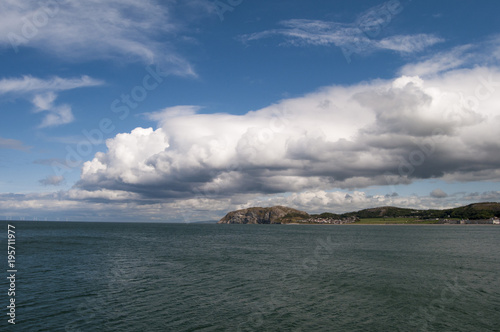 Coastline with blue sky and clouds