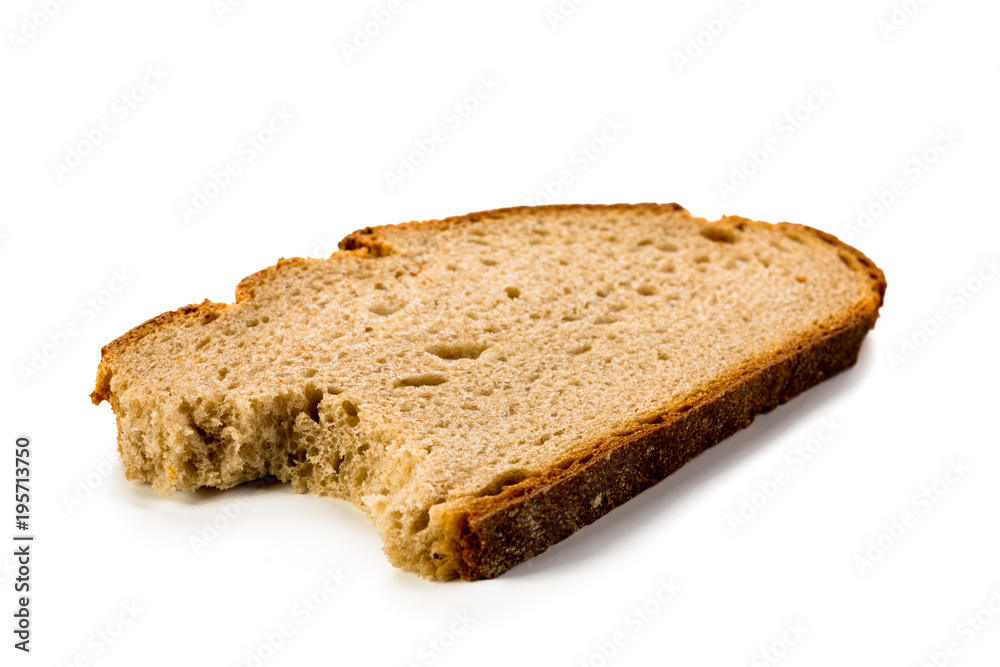 Slice of bread bitten on white background Slice of bread bitten on white background