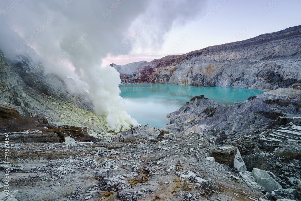 Sulfur burned in the crater blue lake at Kawah Ijen