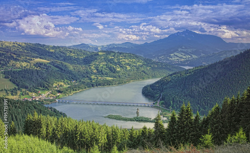 mountain landscape with lake and bridge. Poiana Largului, Romania © Ioan Panaite