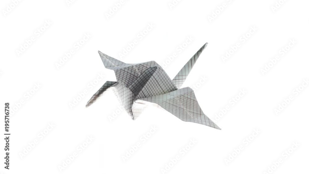 Beautiful heron origami crane animated flying from up left corner to bottom left on a white background. 4K video