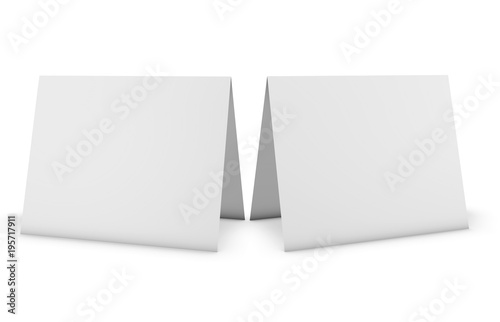 Two blank greeting cards, invitations  standing on white floor, isolated on white.