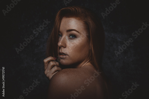 Studio portraits with red hair girl