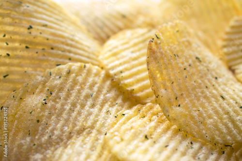 Ribbed potato chips, close-up, background, texture