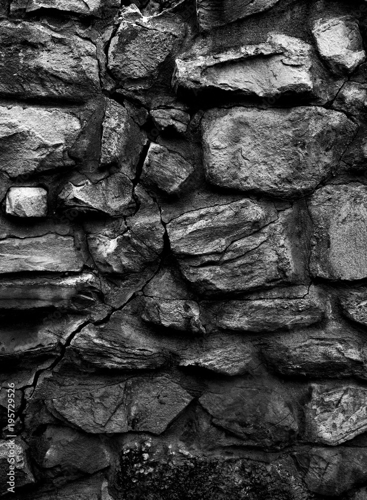 Old monastery wall made of big rocks b&w vertical 3d texture, background Old monastery wall made of big rocks b&w vertical 3d texture, background